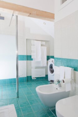 bathroom with turquoise tiles