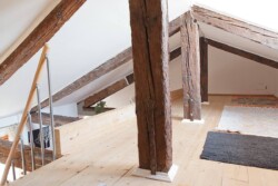 small attic with wooden beams